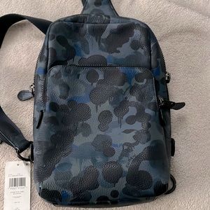 Brand new coach Gotham sling backpack, camouflage print, tag still attached